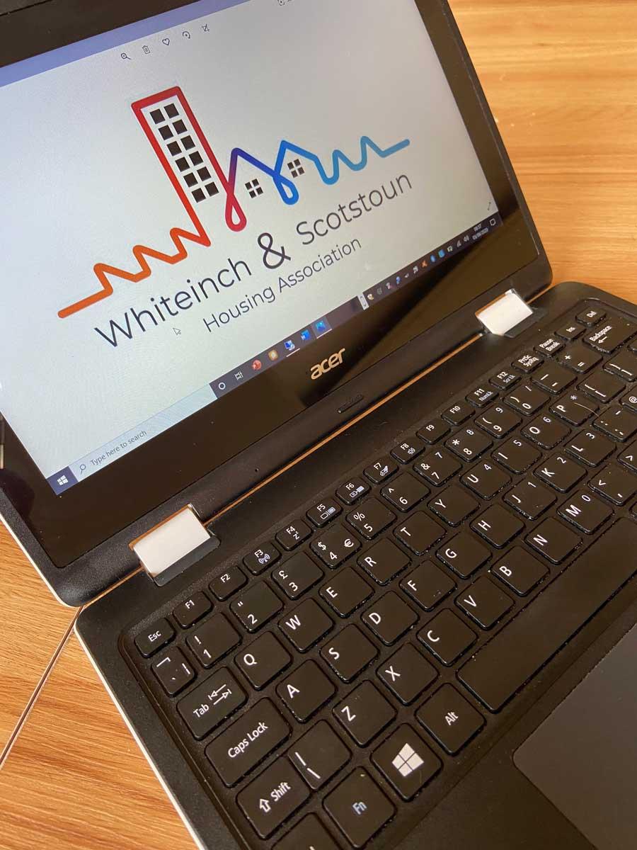 A laptop with a Whiteinch & Scotstoun screensaver